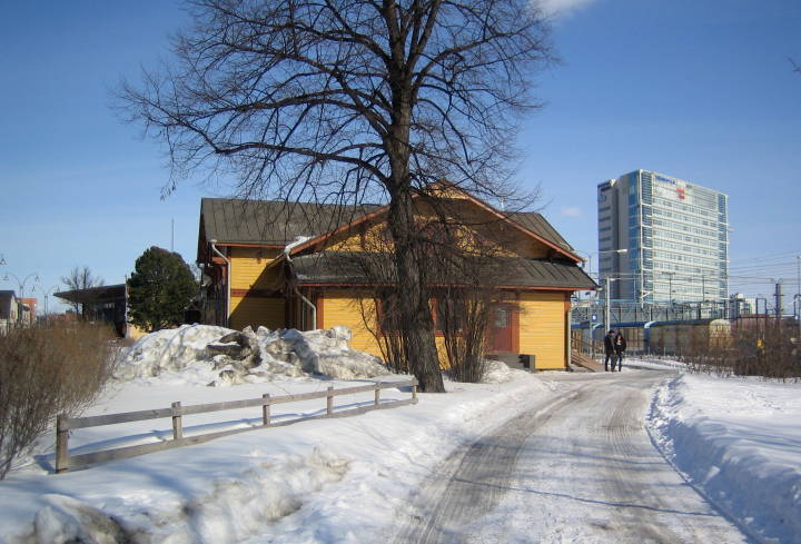 The sound side of the old bright yellow wooden station in Jyväskylä