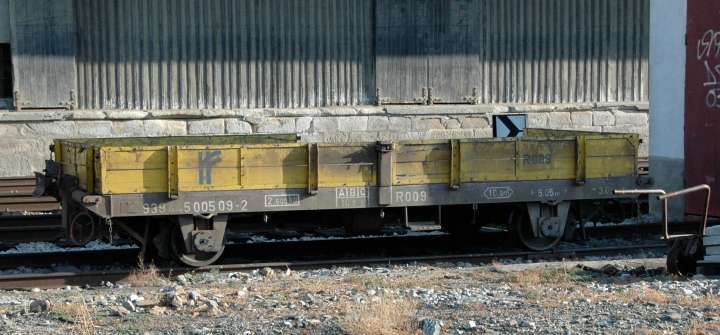 Four-wheel flat car photgraphed alongside the freight house,  Pocinho, Portugal